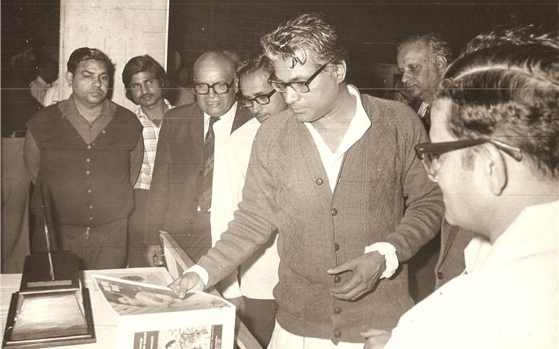 The then union minister, George Fernandes examining print samples produced on the Swifts 150