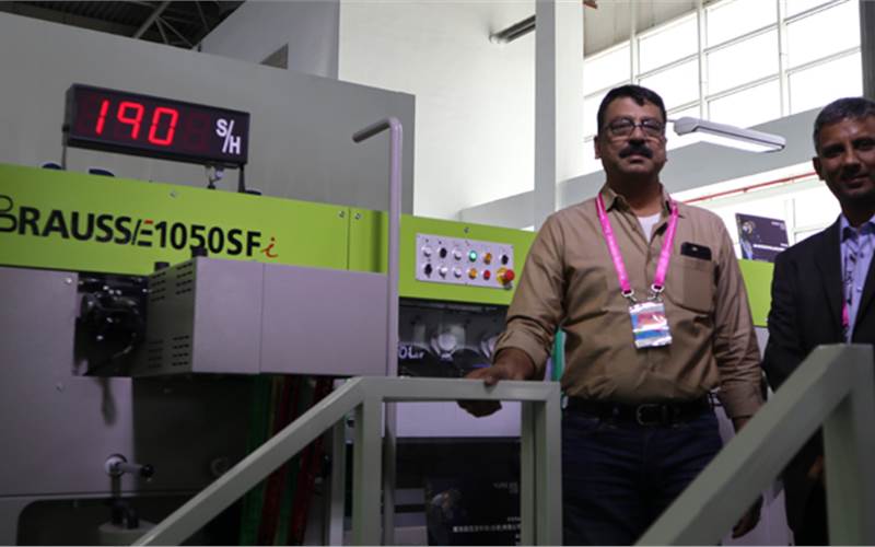 Prasad Kora, managing director at Label Kingdom with Subu Solutions’ new COO for folding carton division, V Ramji, at the Brausse Machinery stand. Suba represents Brausse in India. Kora is one of the biggest rigid box manufacturers in India, producing around 5mn wallet boxes per year for Walmart. It has a capacity to produce 1.2mn mobile boxes per month. Label Kingdom has 10 rigid box making machines, five multi-colour presses and a raft of packaging finishing machines. The company recently installed the Scodix Ultra, which was finalised at Drupa. Soon, the company will be moving to a 1,40,000 sq/ft site in Andhra Pradesh