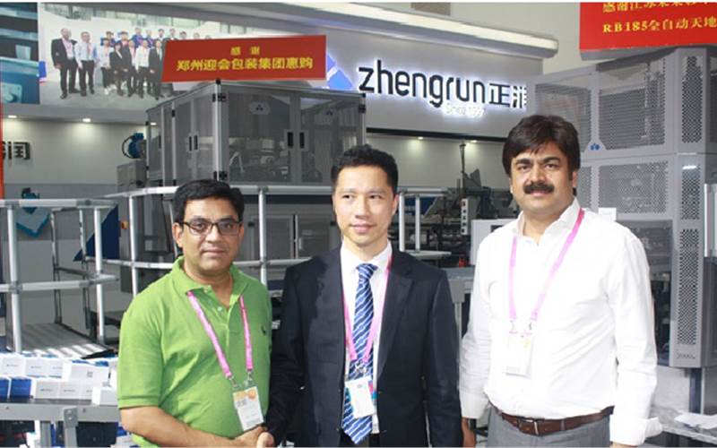 (l-4) Rohit Khanna of Creative Offset, Kevin Wu of Zhengrun and Rakesh Sodhi of Sodhisons, the Indian representative of Zhengrun. Zhengrun launched RB 185, a new machine with robotic arm for more precision in rigid box manufacturing. Noida-based Creative Offset Printers booked the machine at the show
