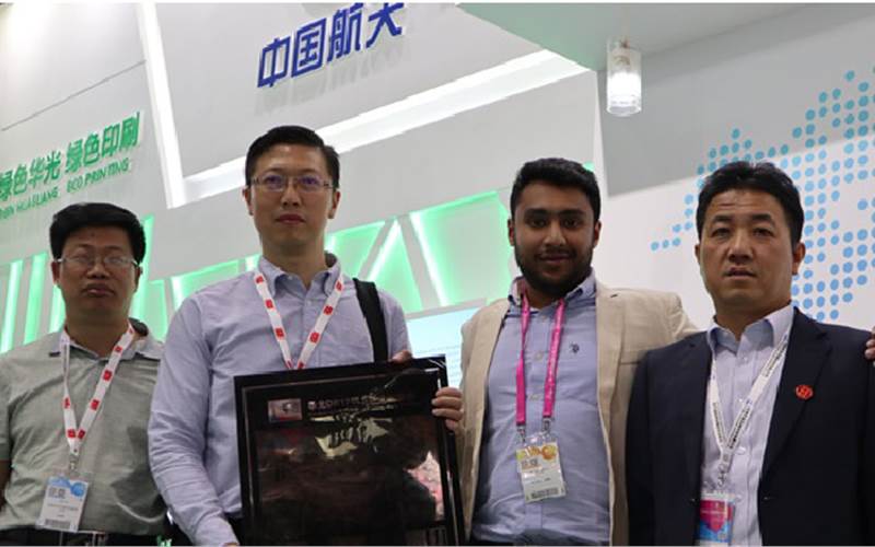 (l-r) Gao Yingxin, Zhang Guo of Lucky Huaguang Graphics; Kaushil Shah of Nulith and Wang Zhi, general manager of Lucky. Nulith represents Lucky flexo plates in India. Lucky introduced its newly developed flat dot digital flexo plates at China Print, which will soon be commercialised. Presently, these plates are being tested. The plates will compete with similar plates produced by Kodak and DuPont. Lucky also manufactures commercial offset plates and films, and export its pre-press products to 150 countries across the globe. Lucky has a capacity to produce 3.5-lakh sq/mts flexo plates per annum, of which 10,000 sq/mts is distributed in India by Nulith
