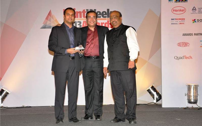 Bobst is the sponsor for Packaging Converter of the Year 2014 (FMCG). In the picture Subhasis Roy of Bobst presenting PrintWeek India Packaging Converter of the Year 2013 Award to Manoj Mehta(r) and Jinesh Mehta(l) of Utility PrintPack