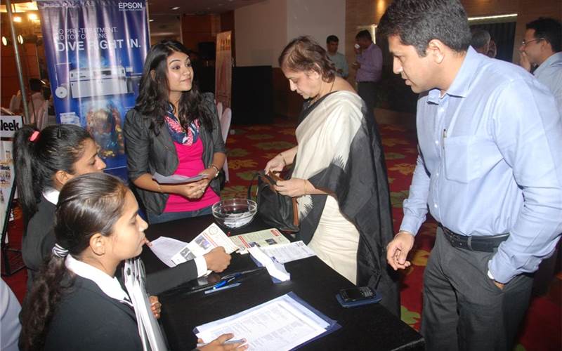 Epson's second roadshow in Mumbai saw top print firms attend the event. In the picture Ankul Nanavaty (r) of Unik Printers and Medha Virkar of Kaleido Graphics at the registration desk