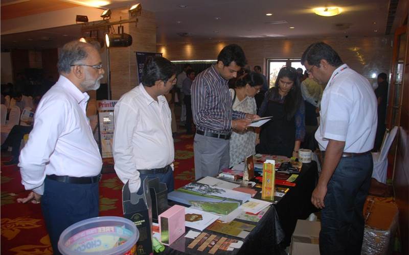 Delegates take a peek at the PrintWeek India Award samples