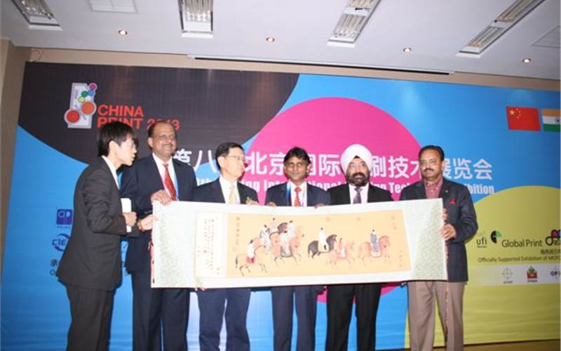 The India Day was held during China Print 2013. Delegates from Indian and Chinese print associations presenting a memento to the chief guest Dr B Balabhaskar, Indian vice ambassador to China in Beijing
