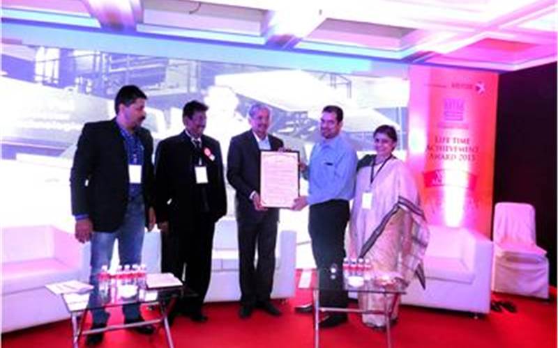 Maharashtra&#8217;s minister of industries presents lifetime honour to Gautham Pai of Manipal Group