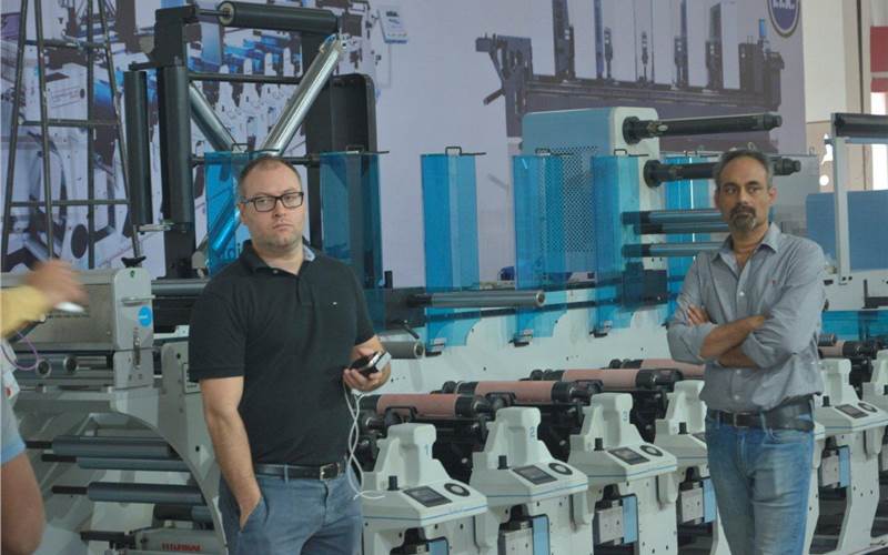 Massimo Lombardi, international sales manager, Lombardi (K-5 and K-8) with the Synchroline 430. The Indian representative Vinsak confirms two installations and three more to come
