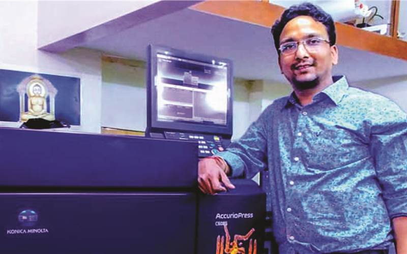 Anuj Jain, owner, Parshvi Graphics with the new machine