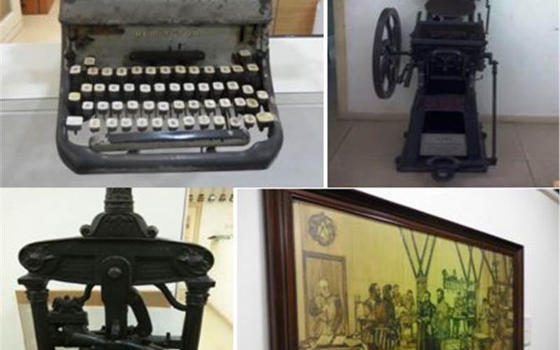 Jak has kept the print history alive. An old letterpress is placed with other antique collector's item; a stone lithography press. Also, a Gutenberg-age painting adorns the print house