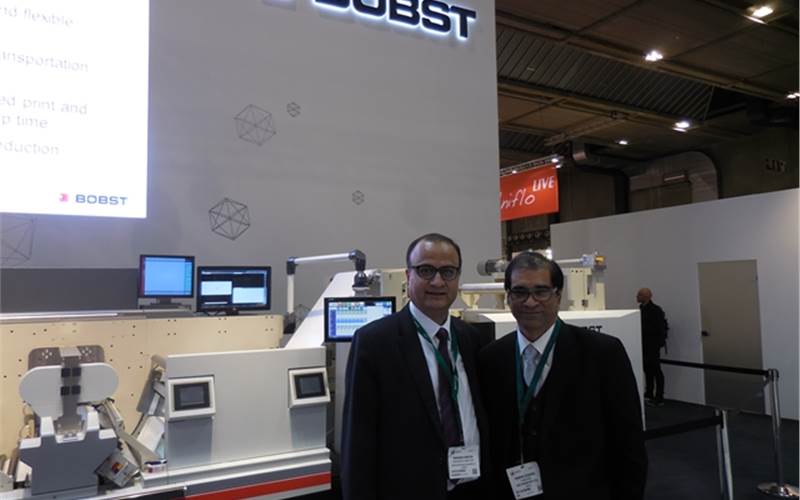 Gautam Mehra of Reifenhauser India (left) and Deepak Duggal of Kap Cones after signing the deal for the Bobst M6 line in Labelexpo Europe 2015