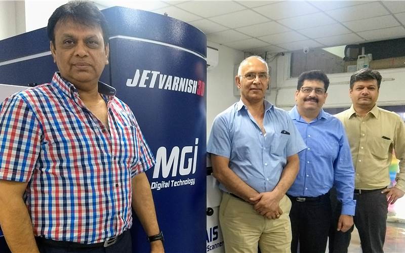 (from left) Kamal Malik and Ravinder Kumar of Printology Xperts, and Rajeev Ahuja and Manish Gupta of Konica Minolta