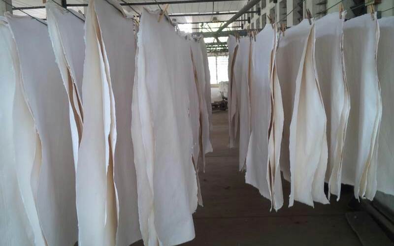 In the last stage, the sheets are put up for drying. In this process, the sheets absorb moisture from the air thus giving it the wavy and varied texture