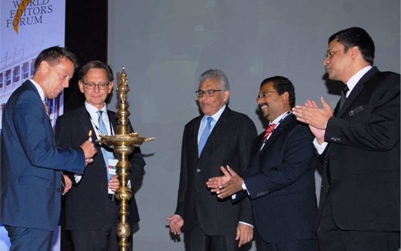 Wan-Ifra President, Tomas Brunegard lighting the lamp at the inauguration of Publish Asia 2013