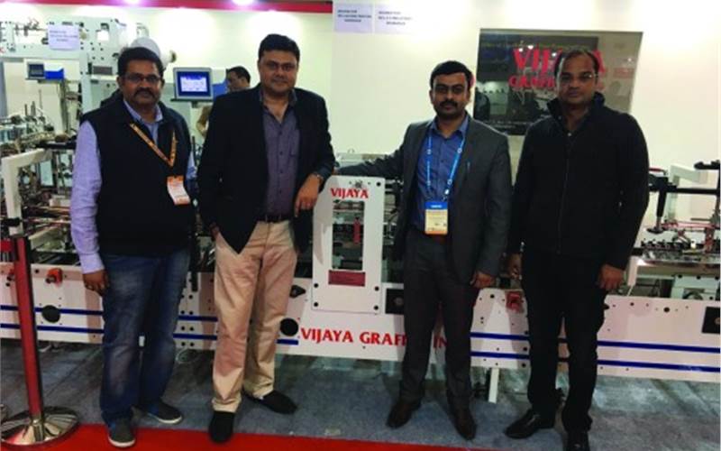 Rajeev Gattani (second from left) of Siliguri-based Fortune Graphics has booked a folder-gluer Veenine 65 showcased at Vijaya Grafik’s stand