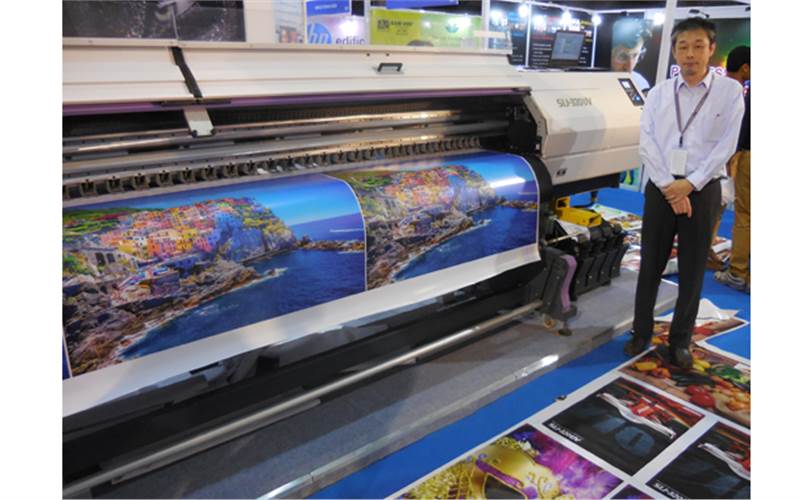Tomohiro Ikeda of Mimaki India with the SIJ-320UV grand-format LED–UV inkjet printer. The company also displayed its JFX200-2513, UJF-3042 Mk II and UJF-6042 MkII printers