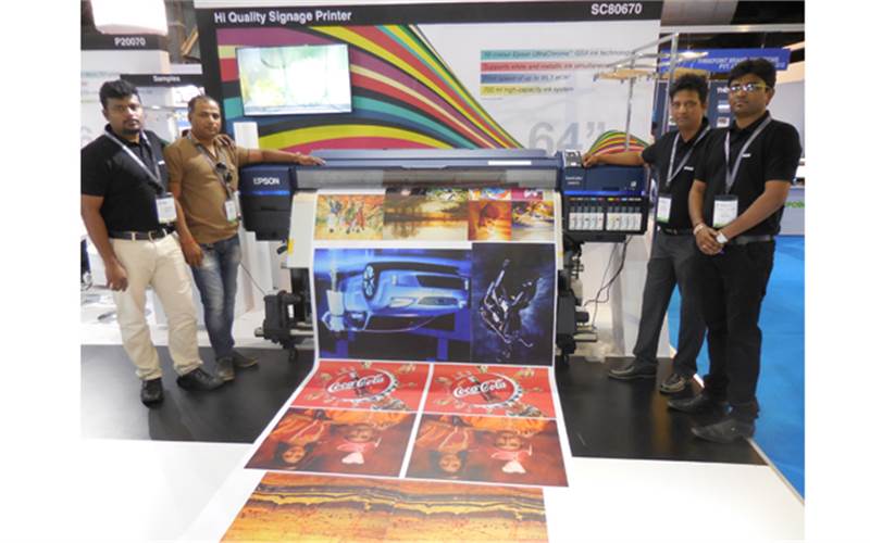 Milind Chavan (second from right) of Epson India. The company showcased its SureColor SC-S80670 eco-solvent wide-format printer, designed for indoor and commercial applications