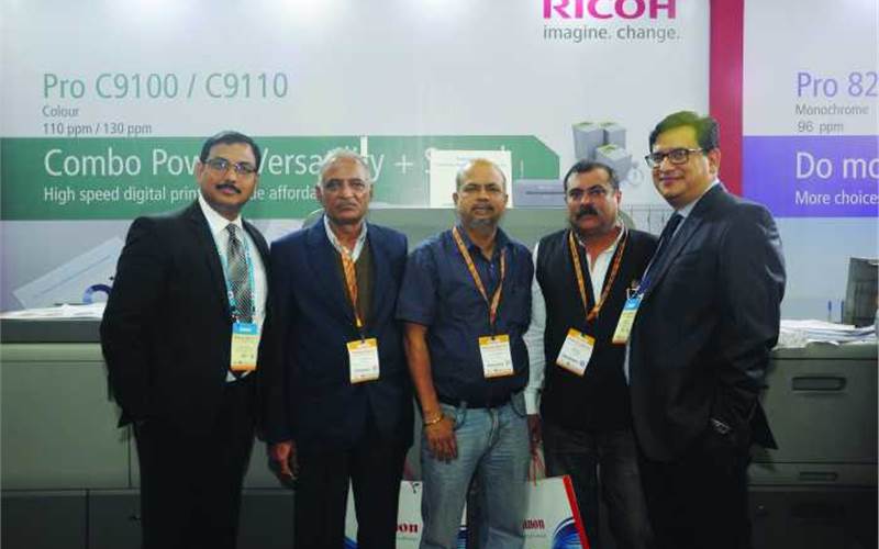 (r) Sambit Misra, chief operating officer at Ricoh informed that all the machines on display at the stand were booked, five of which were C9100 including one to Titu Print (in pic)