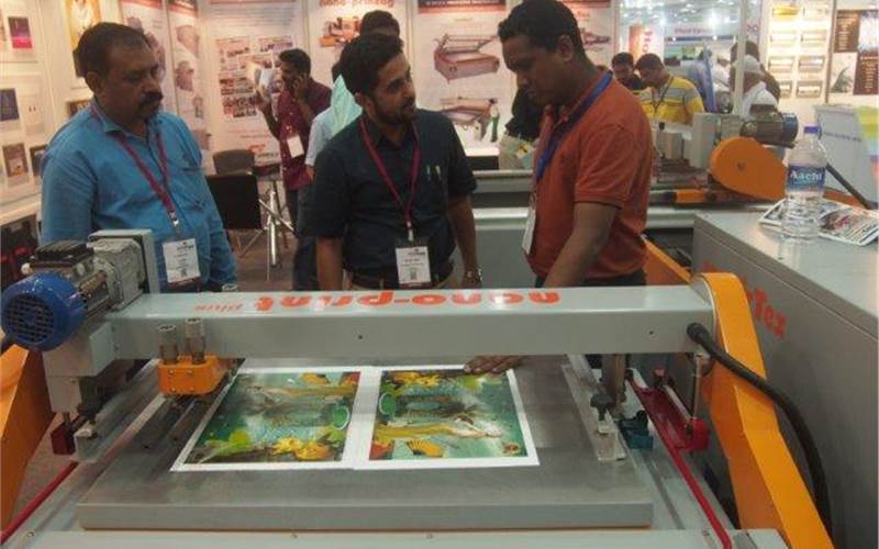 Vasai-based manufacturer of screen printing and allied machinery, Grafica Flextronica had showcased its swing cylinder press with in-line UV and nano series of screen printing machines at the expo. A customer from Bangladesh interacts with the Grafica team in the picture