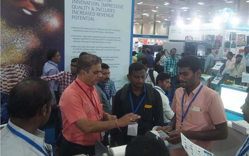 Hi-Tech Systems, the Mumbai-based distributor of print finishing equipment were seen part of the Canon stall this time but were busy as ever. Parag Shah of Hi-Tech seen interacting with customers