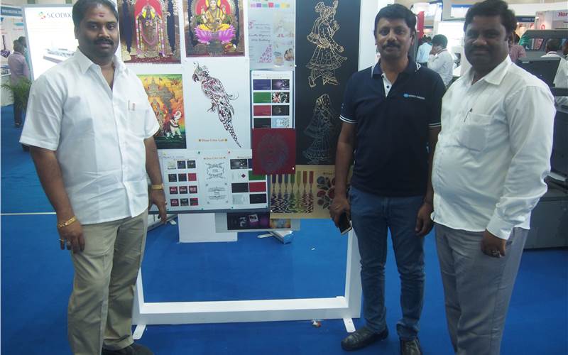 The iFoil sample gallery printed from MGI's Jetvarnish 3DS was also featured at the Konica Minolta stall. Chennai-based Dina Color Lab are the first in India to install the machine provided the samples. Dr M Dinakaran, managing director of Dina Color Lab is seen in the picture along with K V Jayavel and S R Vasudevan of Konica Minolta