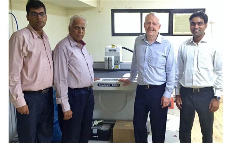 (l-r) Gobind and Kishin Panjabi of Rukson packaging with John Winderam and Umesh Kagde of Esko