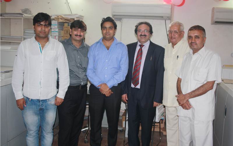 The Dharam Digital family with Dr Alok Bharadwaj