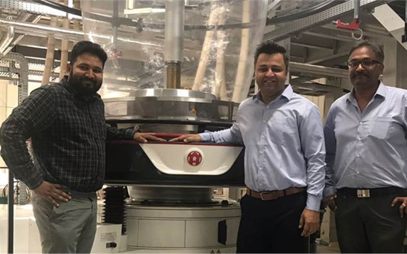 The company has also backward integrated with a new 2.8-metre wide W&H Varex three-layer blown film line. In picture (l-r): Pranav Bhalara of Balaji Multiflex, Anuj Sahni and Vineet Gupta of W&H
