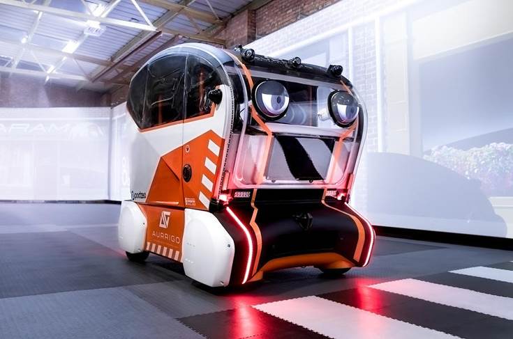 Autonomous Jaguar Land Rover vehicle projects images on road ahead ...